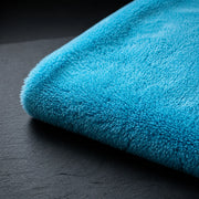 Macro view of the HexaGloss 450 GSM cyan plush edgeless buffing towel